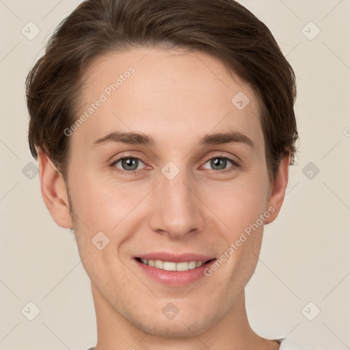 Joyful white young-adult female with short  brown hair and grey eyes