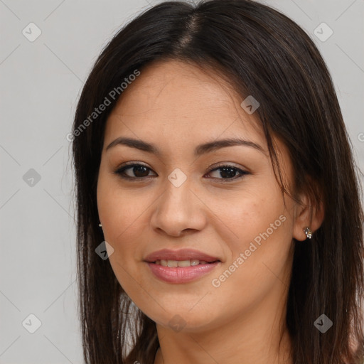 Joyful latino young-adult female with long  brown hair and brown eyes