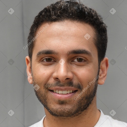 Joyful white young-adult male with short  black hair and brown eyes