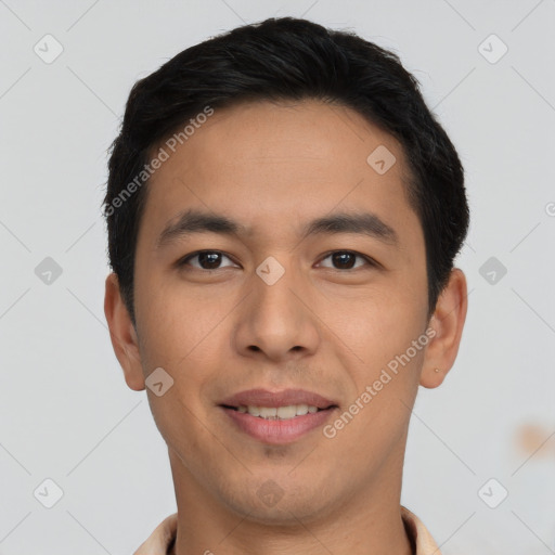 Joyful asian young-adult male with short  black hair and brown eyes