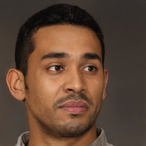 Neutral latino young-adult male with short  brown hair and brown eyes