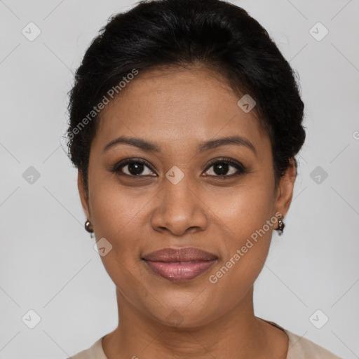 Joyful black adult female with short  brown hair and brown eyes