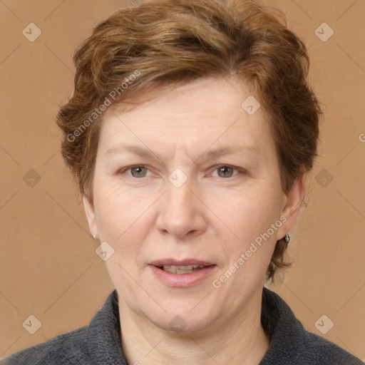 Joyful white adult female with short  brown hair and grey eyes