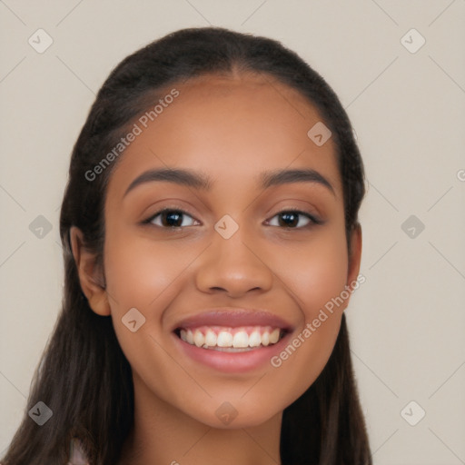 Joyful latino young-adult female with long  black hair and brown eyes