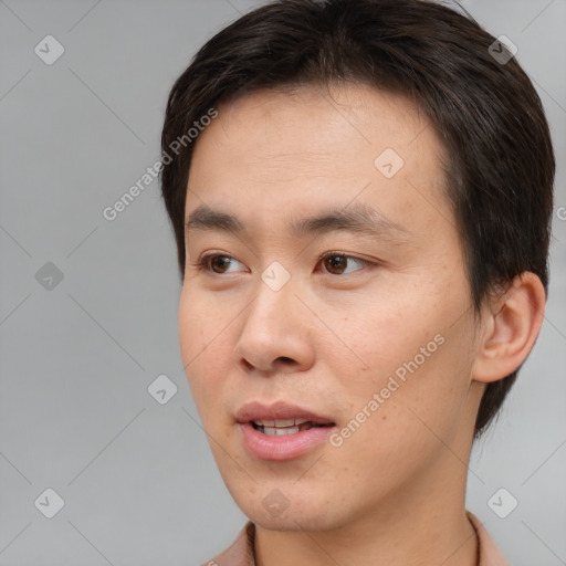 Neutral white young-adult male with short  brown hair and brown eyes