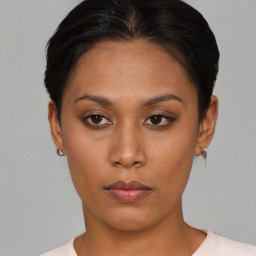 Neutral asian young-adult female with short  black hair and brown eyes