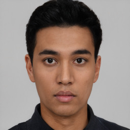 Neutral asian young-adult male with short  black hair and brown eyes