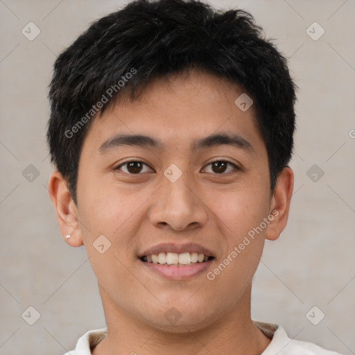 Joyful asian young-adult male with short  brown hair and brown eyes