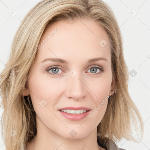 Joyful white young-adult female with long  brown hair and blue eyes