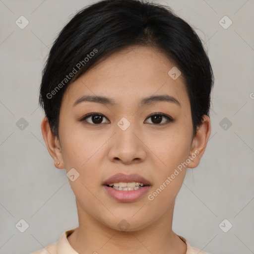 Joyful asian young-adult female with short  black hair and brown eyes