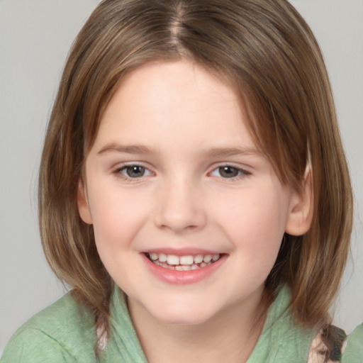 Joyful white child female with medium  brown hair and brown eyes