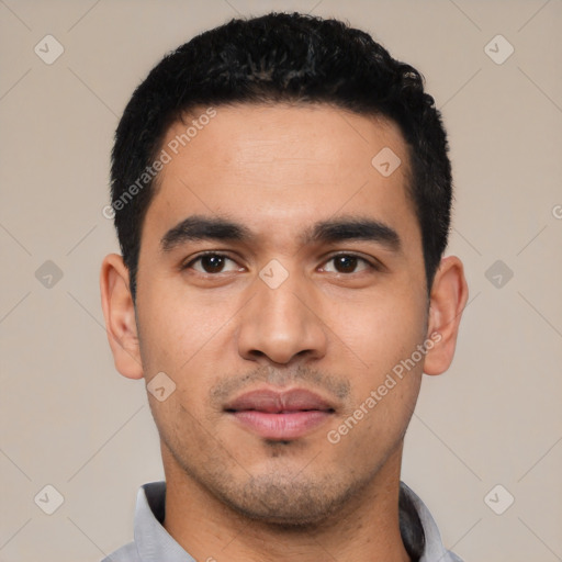 Neutral latino young-adult male with short  black hair and brown eyes