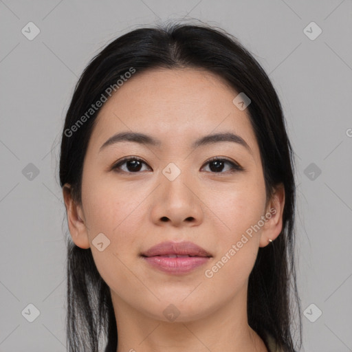 Joyful asian young-adult female with long  black hair and brown eyes