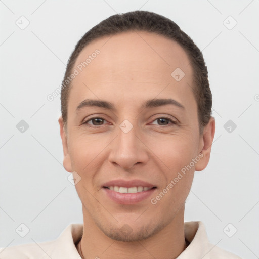 Joyful white young-adult female with short  brown hair and brown eyes