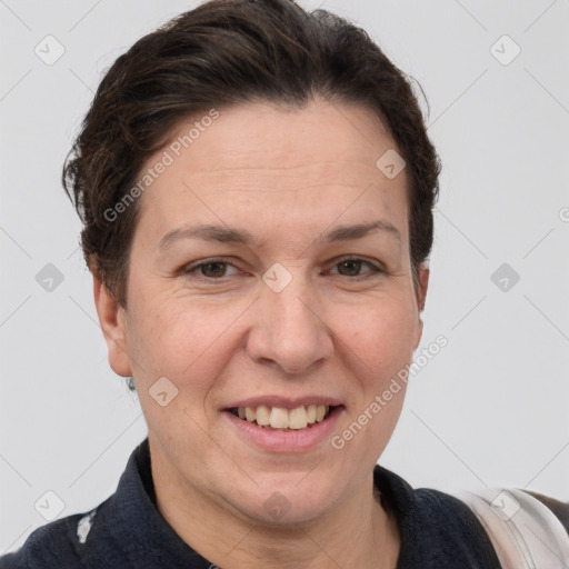 Joyful white adult female with short  brown hair and brown eyes