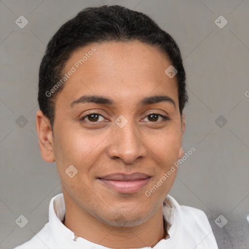 Joyful latino young-adult male with short  brown hair and brown eyes