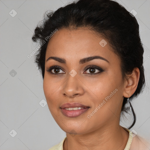 Joyful latino young-adult female with medium  black hair and brown eyes