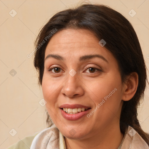 Joyful white adult female with medium  brown hair and brown eyes