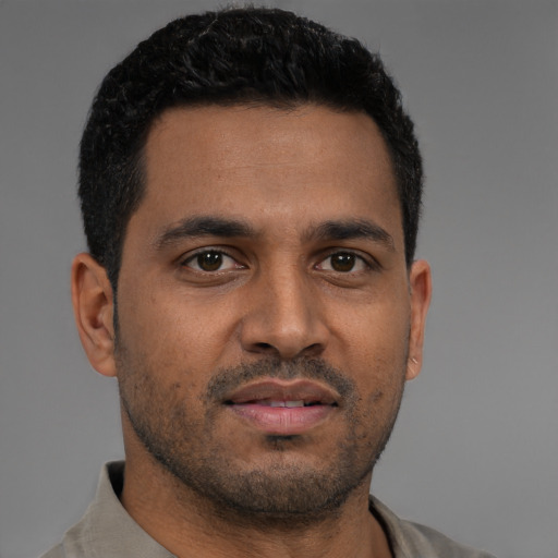 Neutral black young-adult male with short  black hair and brown eyes