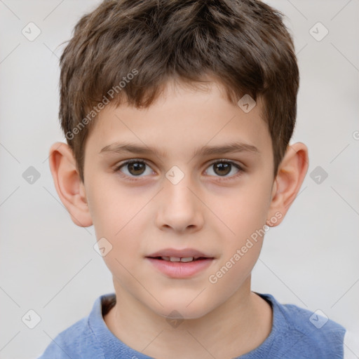 Joyful white child male with short  brown hair and brown eyes