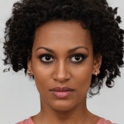 Neutral black young-adult female with short  brown hair and brown eyes