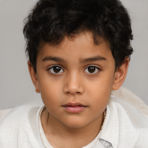 Neutral latino child male with short  brown hair and brown eyes