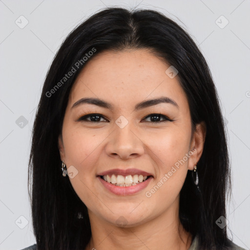 Joyful asian young-adult female with long  brown hair and brown eyes