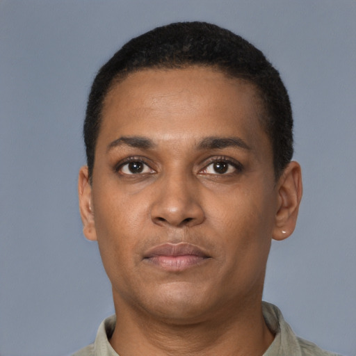 Neutral latino young-adult male with short  brown hair and brown eyes