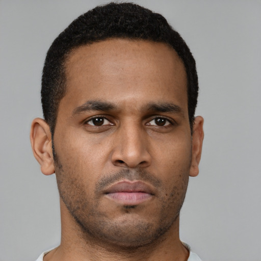 Neutral black young-adult male with short  brown hair and brown eyes
