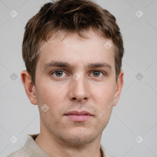 Neutral white young-adult male with short  brown hair and grey eyes