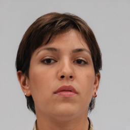 Neutral white young-adult female with short  brown hair and brown eyes