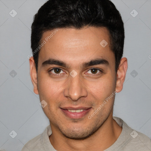 Joyful white young-adult male with short  black hair and brown eyes