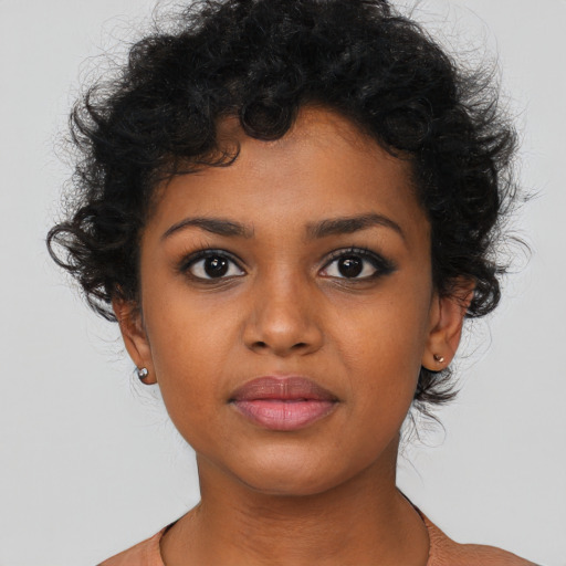 Neutral black young-adult female with short  brown hair and brown eyes
