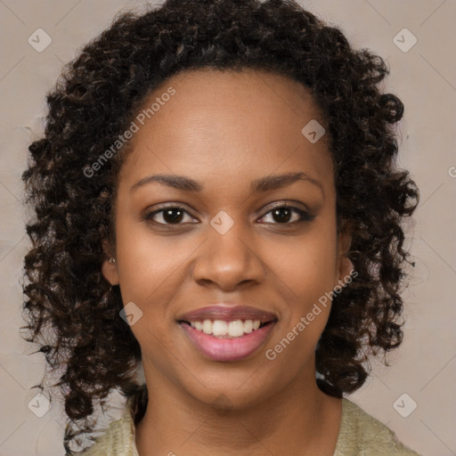 Joyful black young-adult female with medium  brown hair and brown eyes