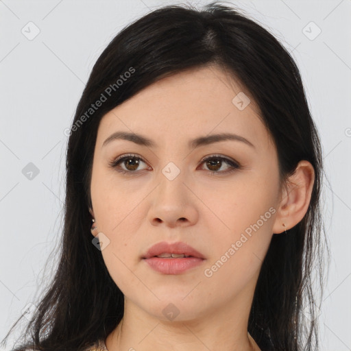 Joyful asian young-adult female with long  brown hair and brown eyes