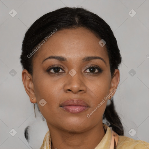 Joyful black young-adult female with medium  brown hair and brown eyes
