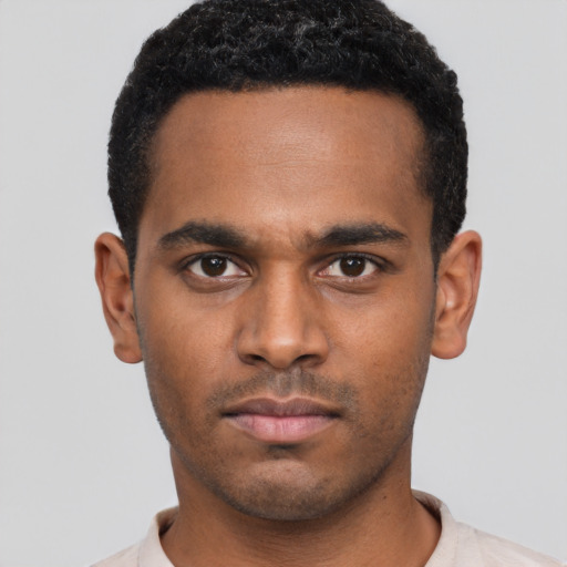 Neutral black young-adult male with short  black hair and brown eyes
