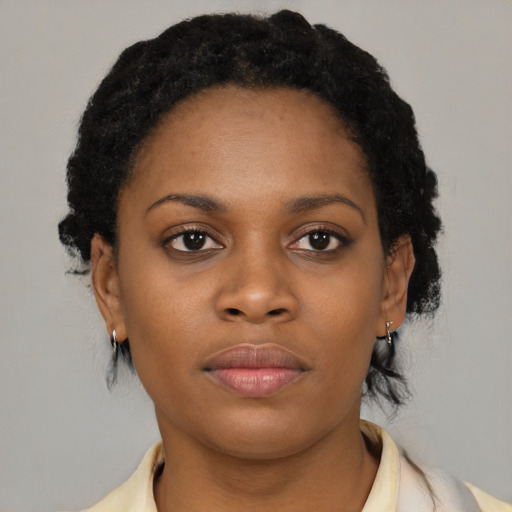 Neutral black young-adult female with short  black hair and brown eyes