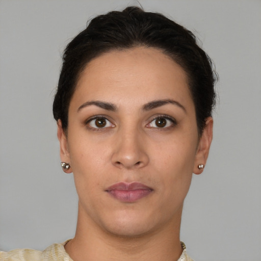Neutral white young-adult female with short  brown hair and brown eyes