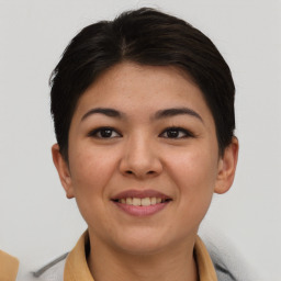 Joyful asian young-adult female with short  brown hair and brown eyes