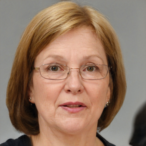 Joyful white middle-aged female with medium  brown hair and blue eyes