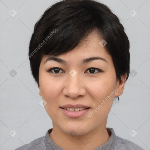 Joyful asian young-adult female with medium  black hair and brown eyes