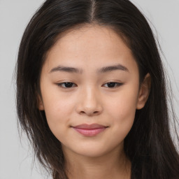 Joyful asian young-adult female with long  brown hair and brown eyes