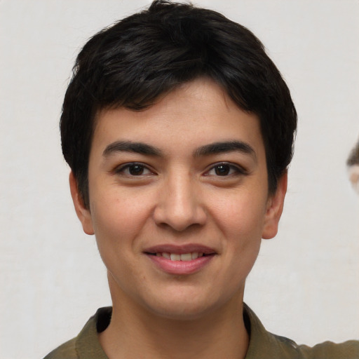 Joyful asian young-adult male with short  black hair and brown eyes