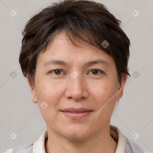 Joyful white adult female with short  brown hair and brown eyes