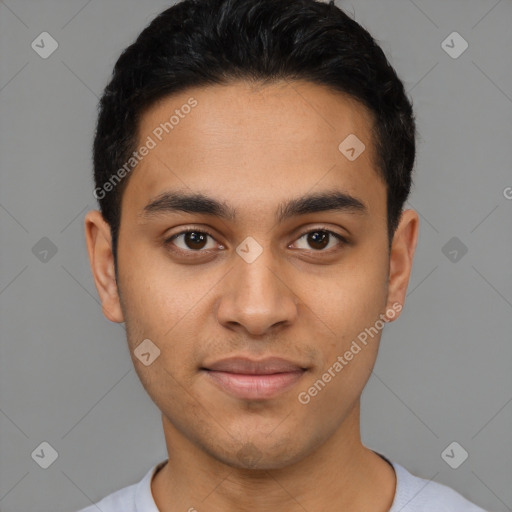 Joyful latino young-adult male with short  black hair and brown eyes