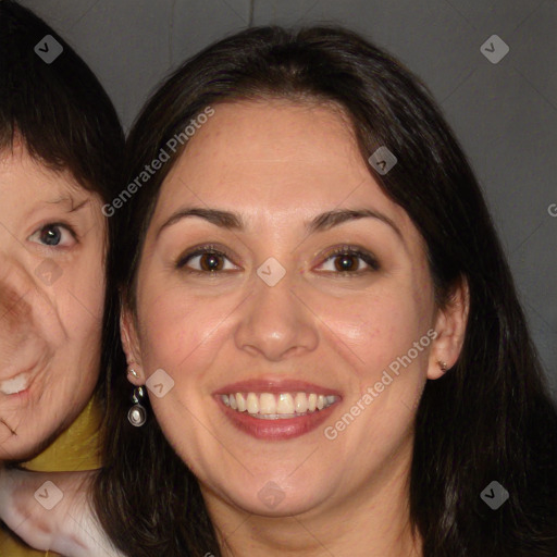 Joyful white adult female with long  brown hair and brown eyes