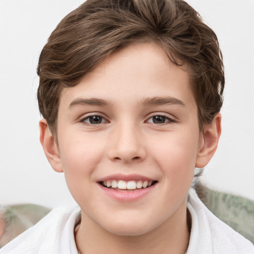 Joyful white child female with short  brown hair and grey eyes