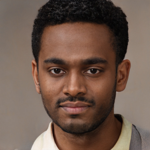 Neutral black young-adult male with short  black hair and brown eyes