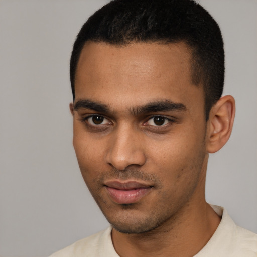 Neutral black young-adult male with short  black hair and brown eyes